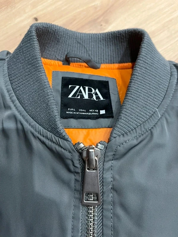 Modern grey bomber jacket – minimalist and urban style – photo 2